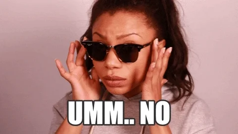 A woman looks out from a pair of sunglasses and says, "Umm...no."