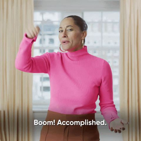 A woman saying, 'Boom! Accomplished!'