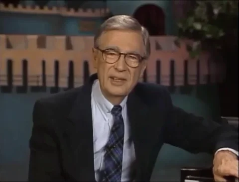 Mr. Rogers warmly speaks to the viewers, 