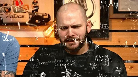 A man is doing mental math with math equations surrounding him.