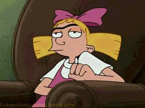 Helga from Hey Arnold! looking bored on an armchair.