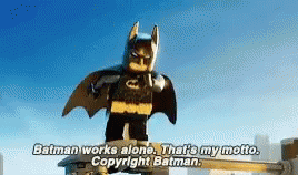 Lego Batman saying 'Batman works alone. That's my motto. Copyright Batman'
