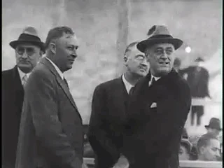 President Roosevelt meeting with government officials.
