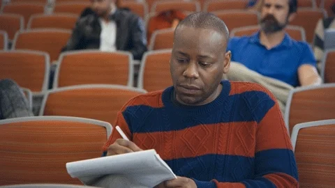 A man taking notes. Spying I Hear You GIF by NOW WE'RE TALKING TV SERIES