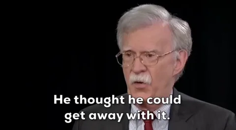 An ollder white man in glasses says, 