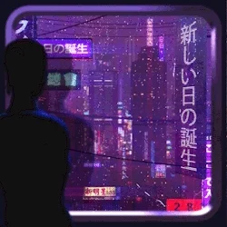 A person looking out of a window at a Japanese city.