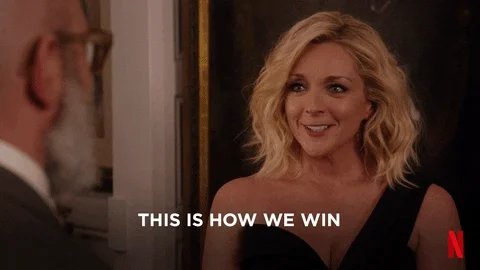 Two characters from The Unbreakable Kimmy Schmidt saying, 'This is how we win.'