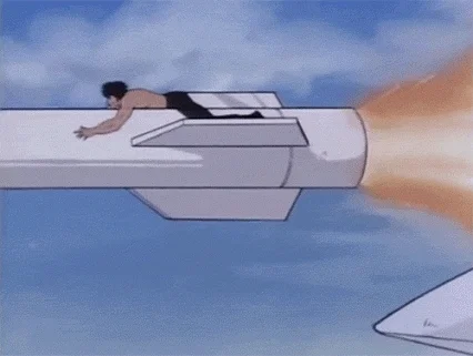 Cartoon version of Rambo riding a missile through the air while giving the thumbs-up.