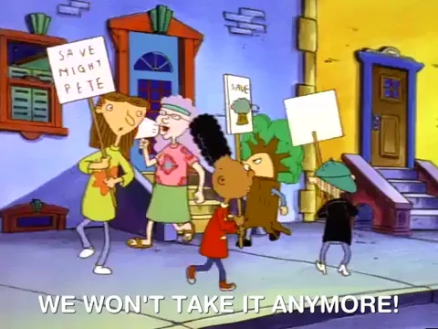 Characters from Hey Arthur protesting on the street with placards.