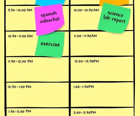 Post-it notes being stuck on a perosnalized learning schedule.
