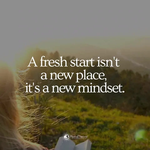 A person sits on a bench in a peaceful landscape. The text reads: "A fresh start isn't a new place, it's a new mindset."