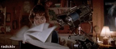A robot from a 1980s sci-fi movie reading through a book in a few seconds.