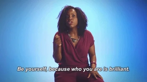 A woman saying, "Be yourself, because who you are is brilliant."