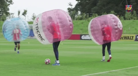 people in bubble bumping into each other