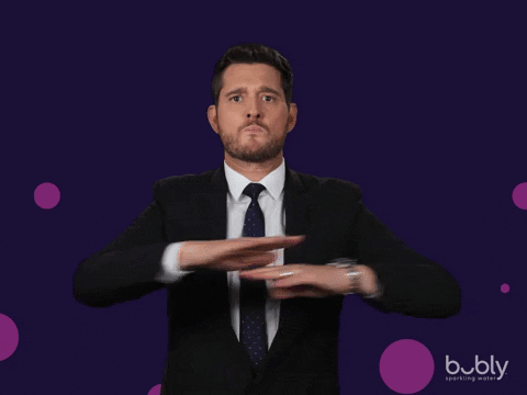 Animated image of Michael Buble waving his hands captioned, 