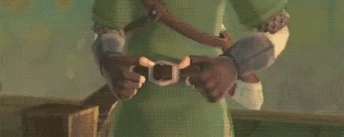 Link, the video game character from Zelda, fastens his belt, getting ready for an adventure.