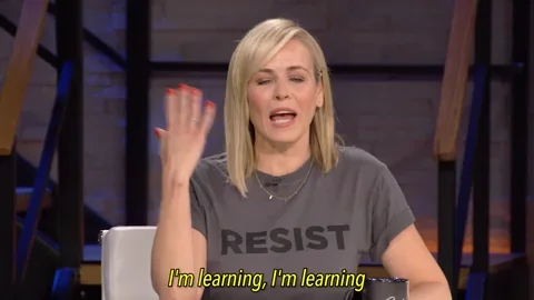 Blonde female comedian Chelsea Handler making a circle with her hand to say that she is always learning