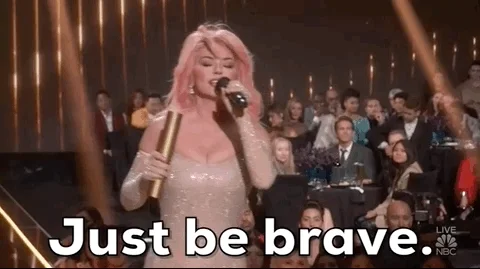 A gif of a lady saying 'just be brave'