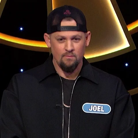 Joel Madden, lead vocalist for the rock band Good Charlotte, giving two thumbs up.