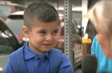 A child crying during a TV interview