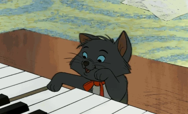 An Aristocat practices scales and arpeggios on a piano while singing.
