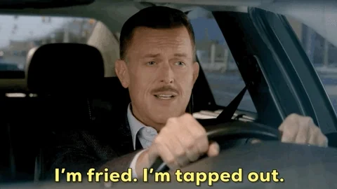 A man driving his car says, 