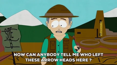 A South Park character at archaeological site asking visitors questions about arrow heads. 