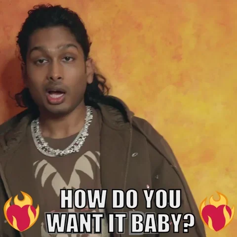 A man leans his head to the side and says, “How do you want it, baby?”