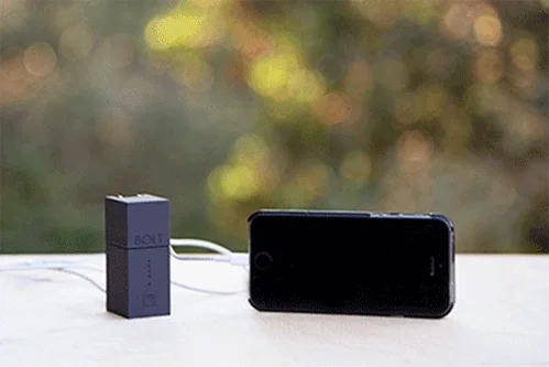 An iPhone battery charging with an external battery.