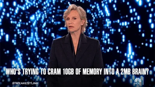 Jane Lynch saying, "Who's trying to cram 10GB of memory into a 2MB brain?"