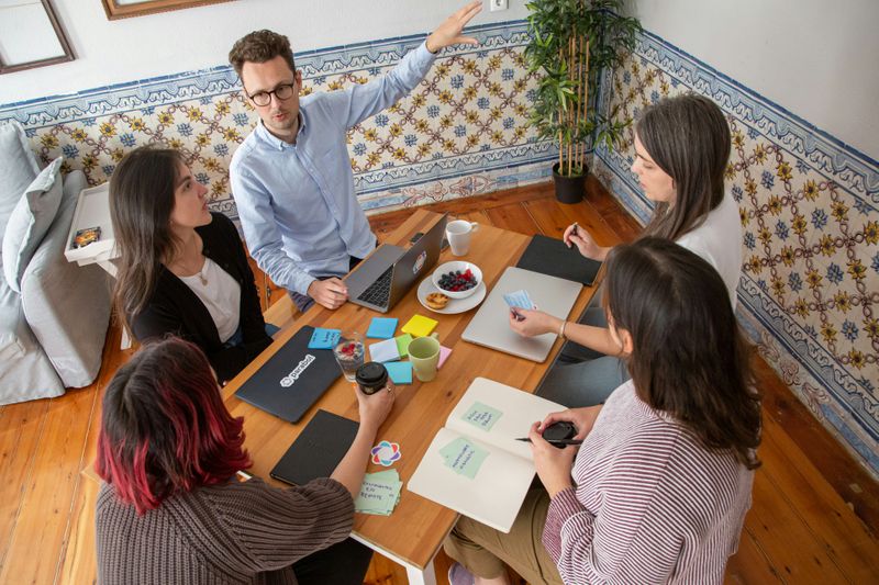 A group of people collaborating in a meeting.