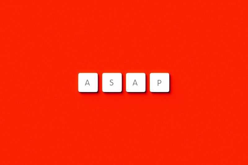 ASAP spelled out in lettered tiles on a red background.