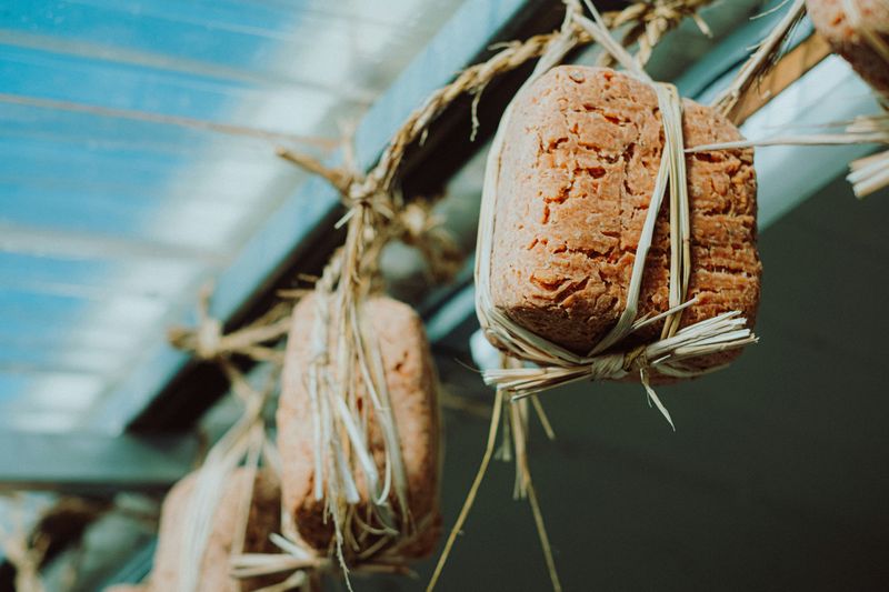 Doenjang, Korean fermented soybean paste, hanging from a roof.