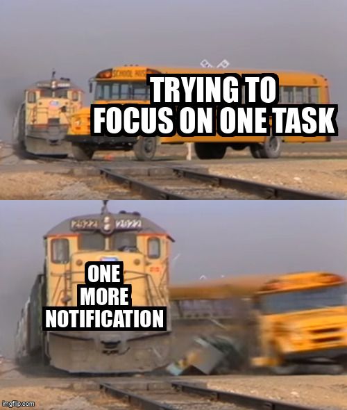  Two trains crashing meme. The first says "Trying to focus on one task" and the second says "One more notification".
