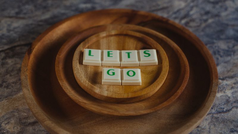 scrabble alphabets that read Lets go