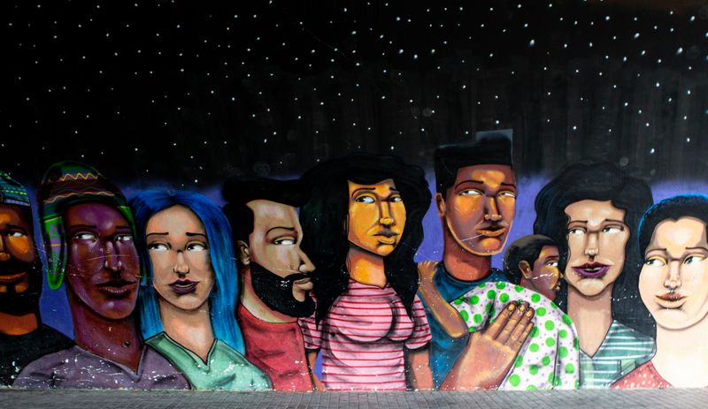 A mural depicting a group of people of different races.