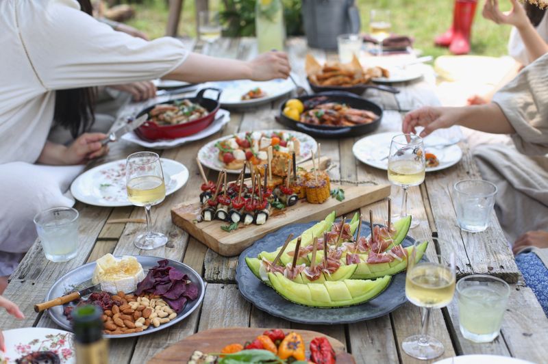 Plates of food in an outdoor dining setup