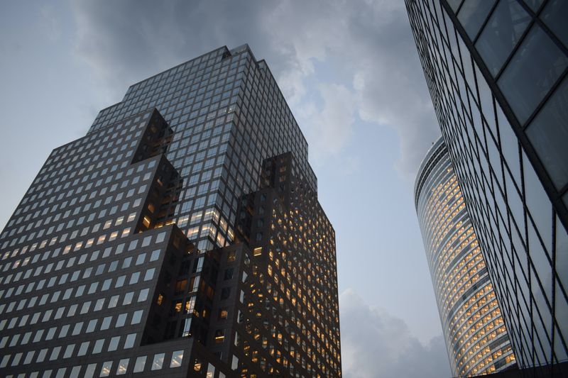 Two skyscrapers with sky behind