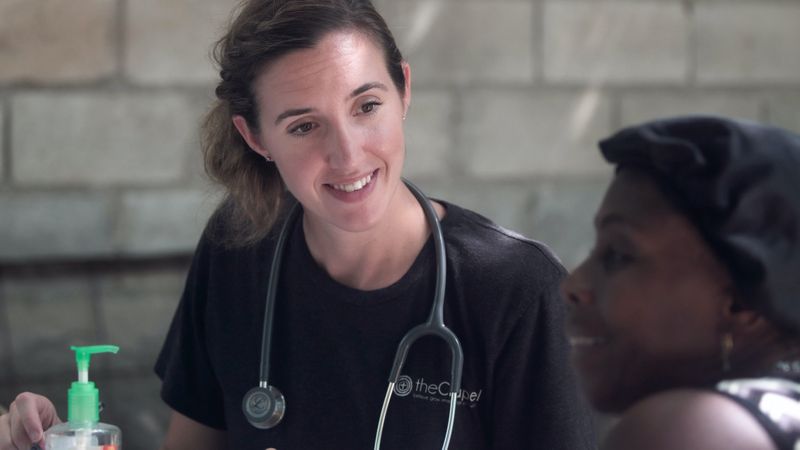 Woman doctor with a woman patient