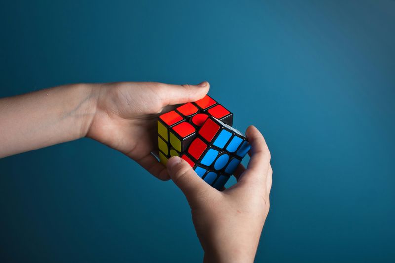 A person solving a Rubik's cube.