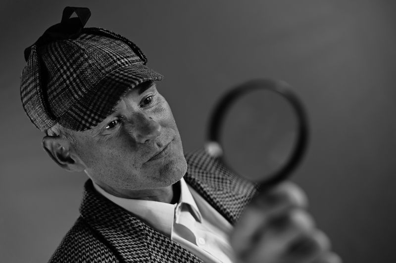 A detective looking for clues.