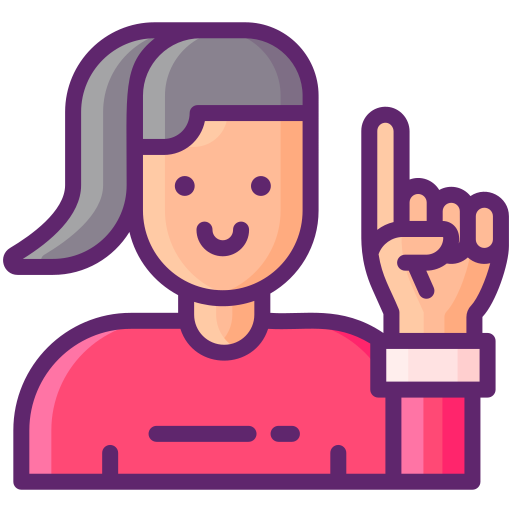 A person with a ponytail holding their hand up with their index finger pointed.