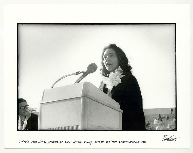 Coretta Scott King speaks at the dais of an outdoor rally against the Vietnam War in 1967.