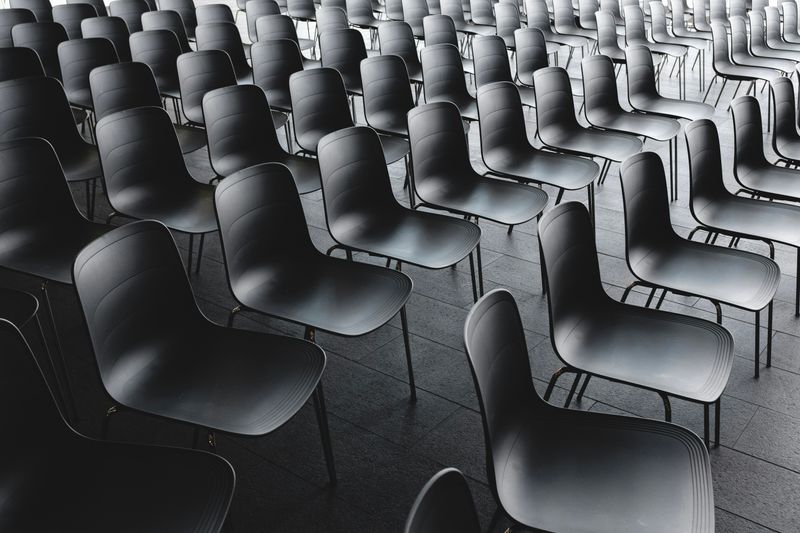 Rows of chairs in a room.