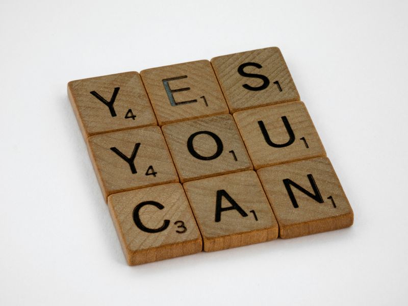 Scrabble letters reading "Yes, you can"