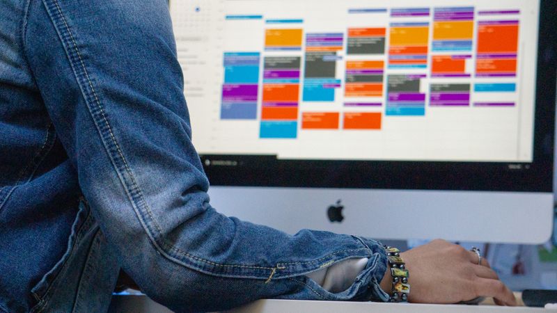 A person on a computer screen accessing their Google Calendar.