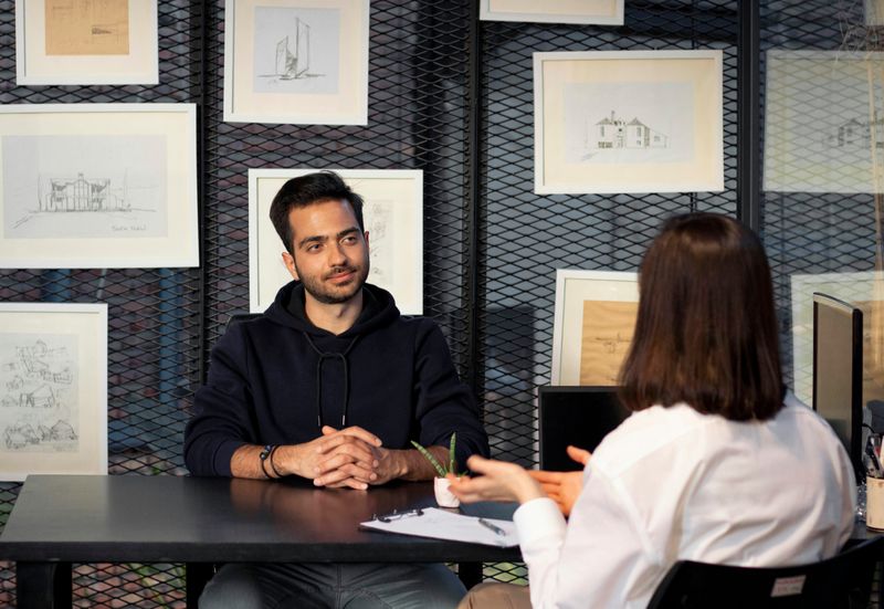 Interviewer and Interviewee at the table