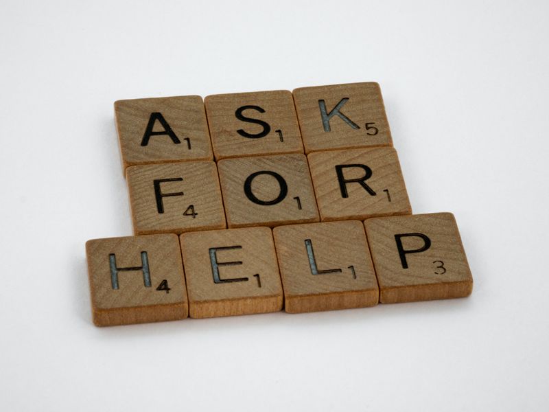 Building blocks indicating “Ask for help”. (Photo by Brett Jordan on Unsplash)