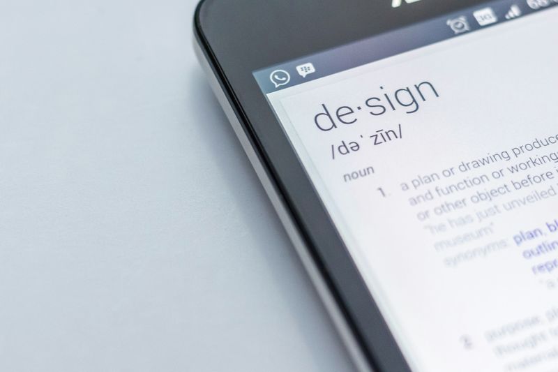 A tablet showing the definition of design.