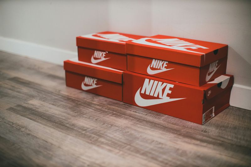 Nike shoe boxes in a room.